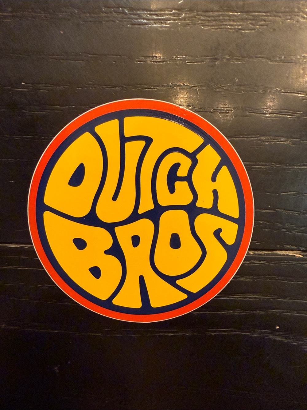 Dutch Bros Retro Round Sticker in Yellow, Orange, Navy